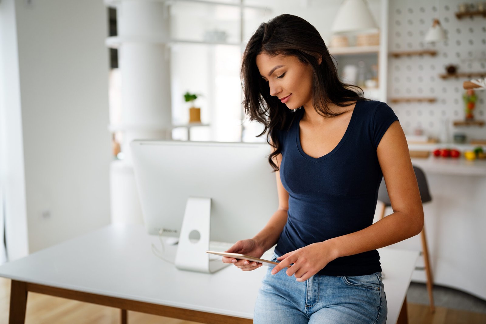 Happy beautiful business woman using digital tablet computer. Business, technology concept